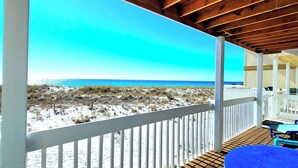 A covered outdoor area with a view of the beach and ocean. - Beachfront Stay with Amazing Views (Destin)
