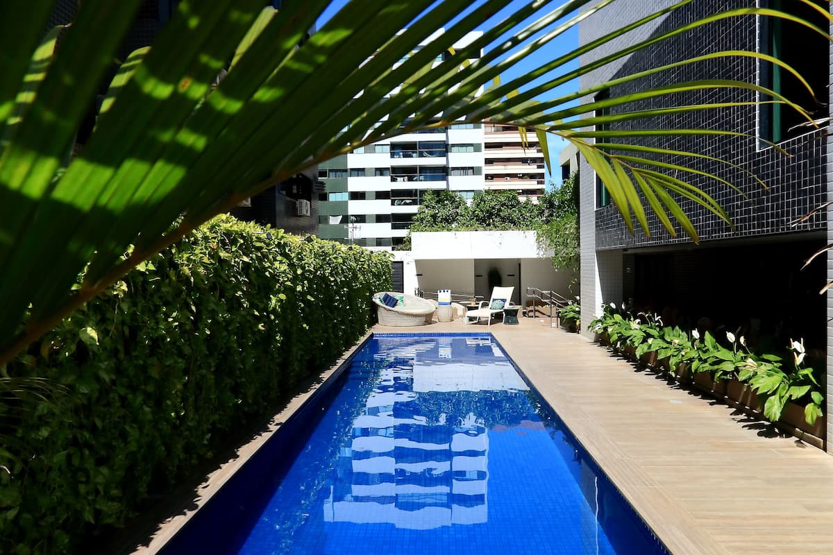 outdoor pool, pool loungers