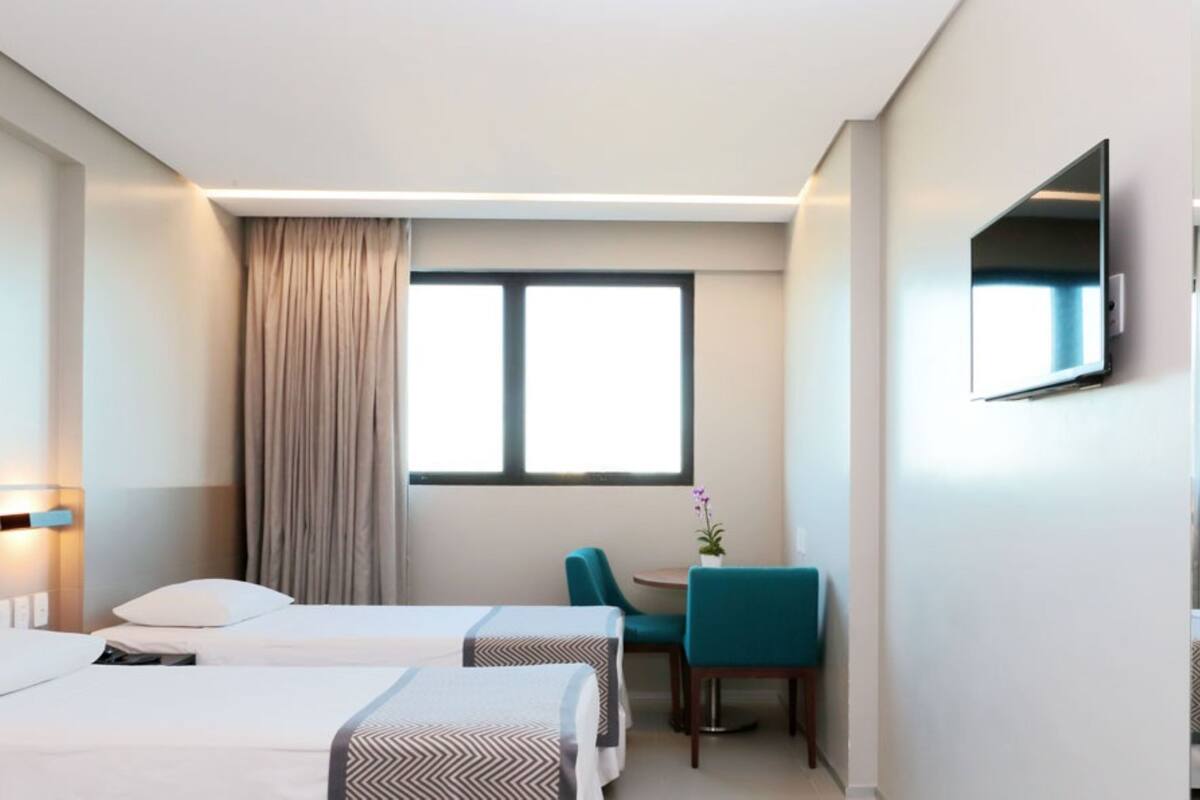 premium twin room, 2 single beds | minibar, in-room safe, desk, blackout curtains