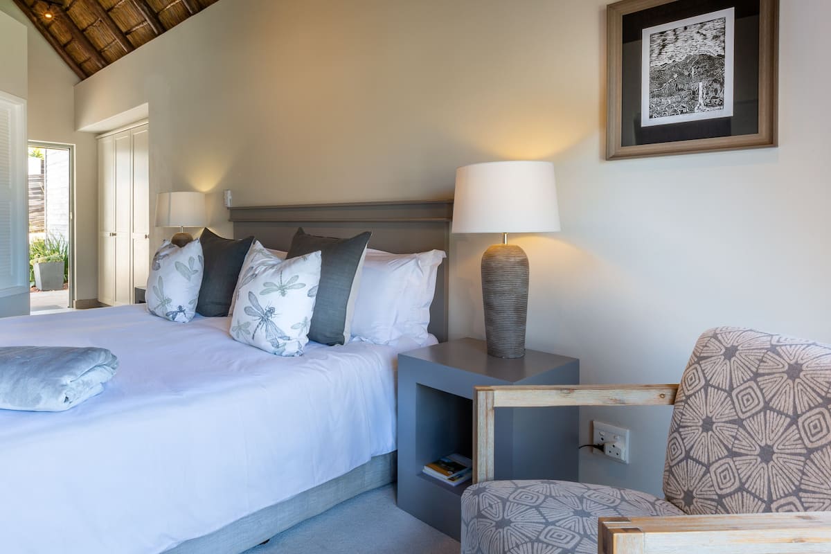 Luxury Guest Suite - King | 1 bedroom, in-room safe, individually decorated, individually furnished