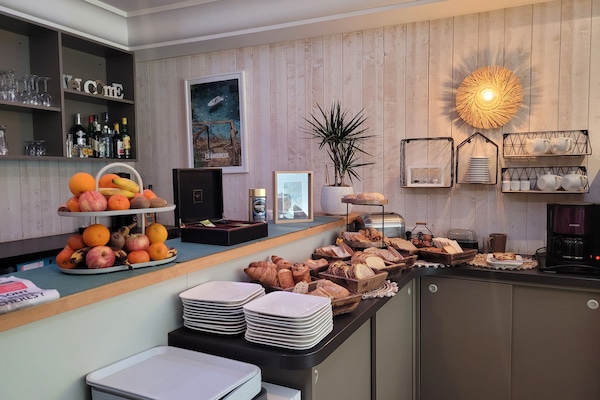 Daily buffet breakfast (EUR 12 per person)