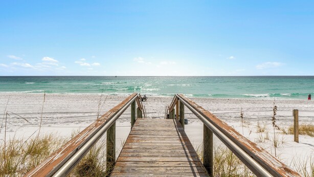 A wooden boardwalk leading to a beach with a clear view of the ocean. - Beach Dune Retreat | 1BR w/ Bunks & Beach Service (Destin)
