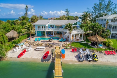 Aquarius North:  7BR/5BA luxury beach house w/ heated pool + spa,  dock & more! 