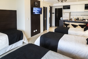 Deluxe-Vierbettzimmer | BettwÀsche aus Àgyptischer Baumwolle, hochwertige Bettwaren, Minibar