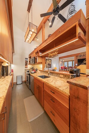 Oven, cookware/dishes/utensils, paper towels - Juniper 122: 2Br+Loft- The Aspens- Renovated Condo with Jackson Hole Charm (Wilson)