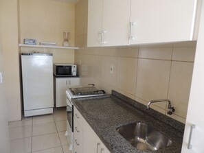 Departamento, 2 habitaciones (Apartamento Quintuplo) | Sala de estar | Televisión de pantalla plana