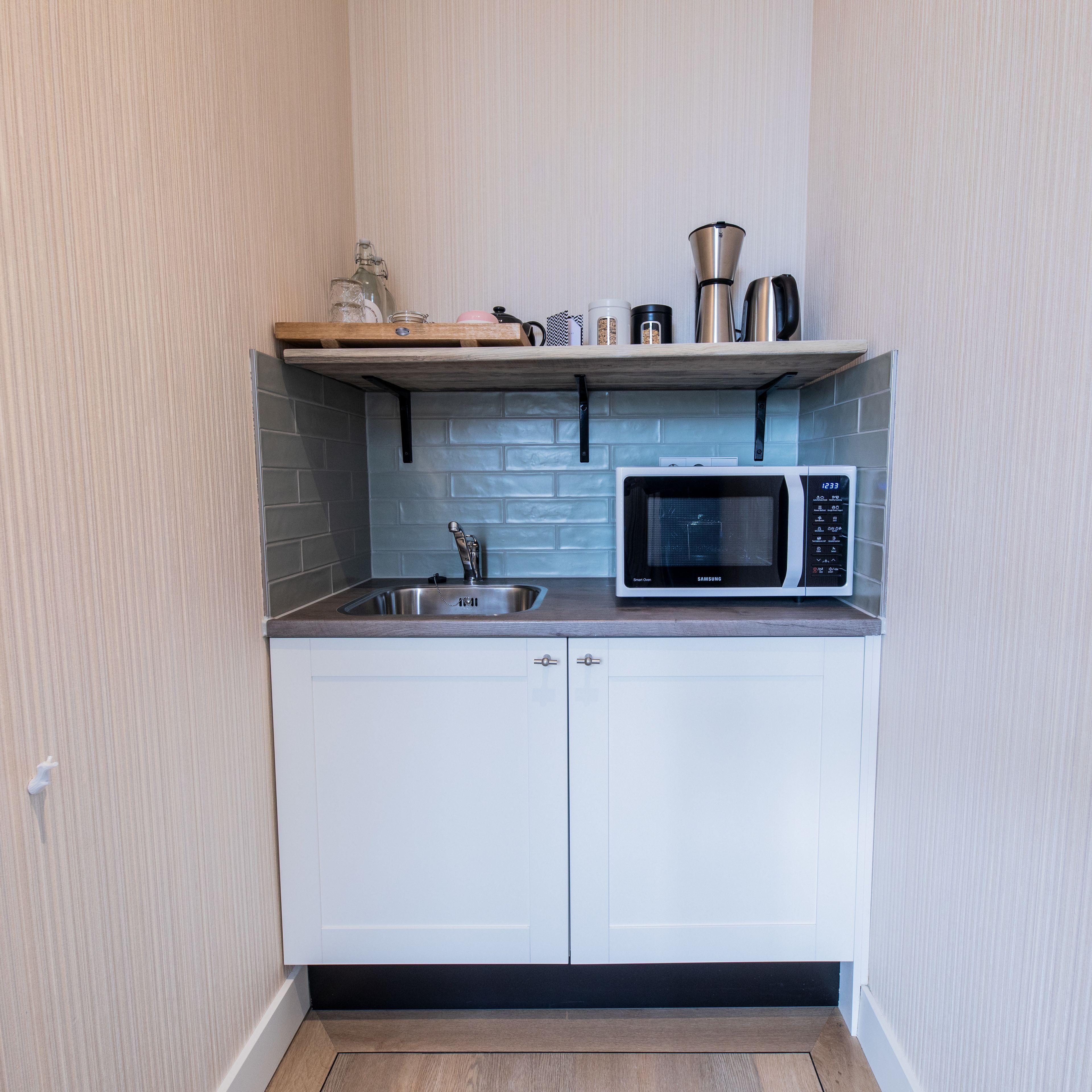 panoramic suite, canal view | private kitchenette | fridge, coffee/tea maker, electric kettle