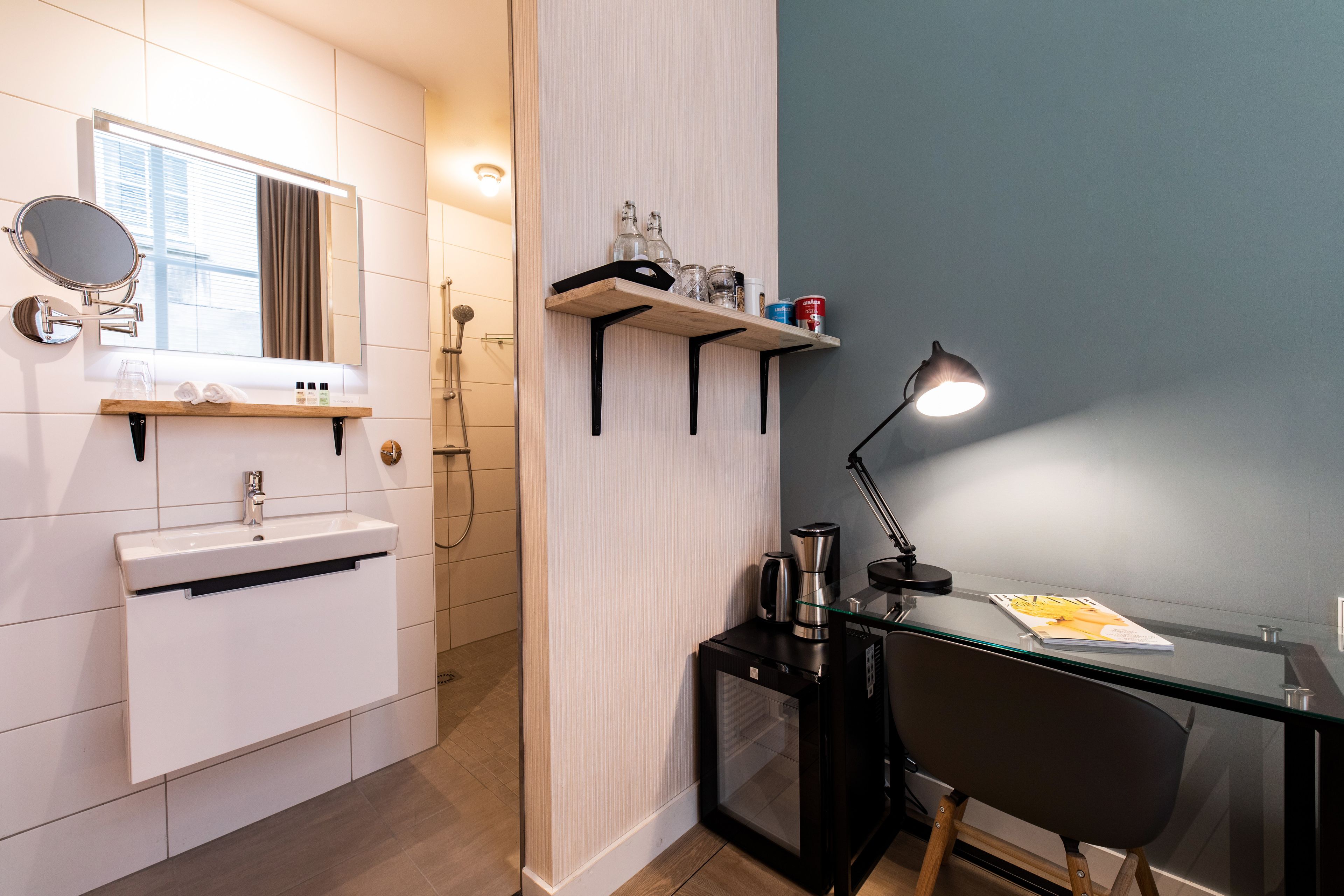 deluxe double room | bathroom | designer toiletries, hair dryer, bathrobes, towels