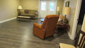 A living room with a sofa, armchair, and coffee table. - Gorgeous Mtn Views, Perfect for Fall, Near Peaks of Otter, D-Day Memorial (Bedford)