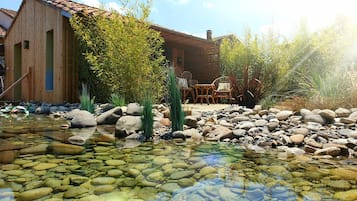 Suíte panorâmica, 1 quarto, acesso à piscina, vista para a piscina (jacuzzi privatif) | 1 quarto, roupas de cama premium, frigobar, cortinas blackout