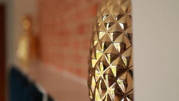 A close-up of a pineapple-shaped decoration with a textured surface.