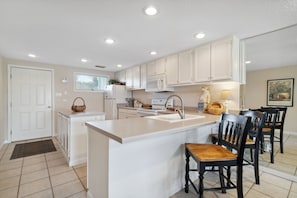 Fridge, microwave, oven, stovetop - Unit 42,  Tropical Town Home, 2.5 Bedroom Beach Condo (Panama City Beach)