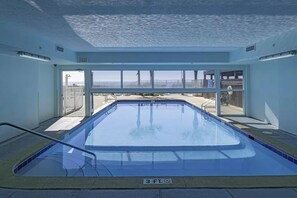 Outdoor pool, a heated pool - Serenity by the Sea - Spacious End Unit Suite w/ Coastal Gulf Views - Lg Balcony (Panama City Beach)