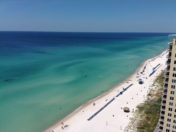 On the beach, sun-loungers, beach towels