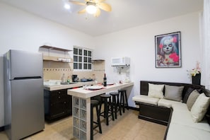 Fridge, microwave, stovetop, coffee/tea maker