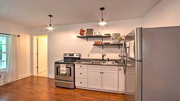 Fridge, microwave, stovetop, coffee/tea maker