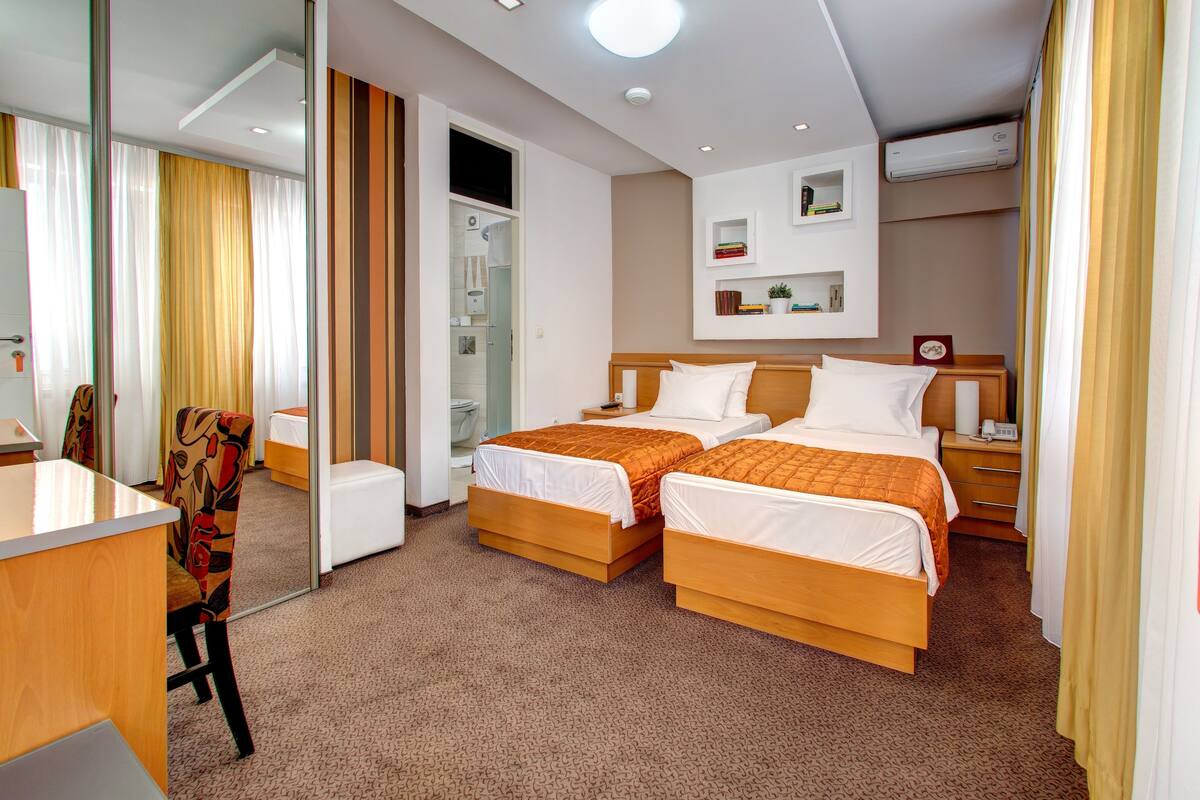 Premium bedding, down duvets, memory-foam beds, desk