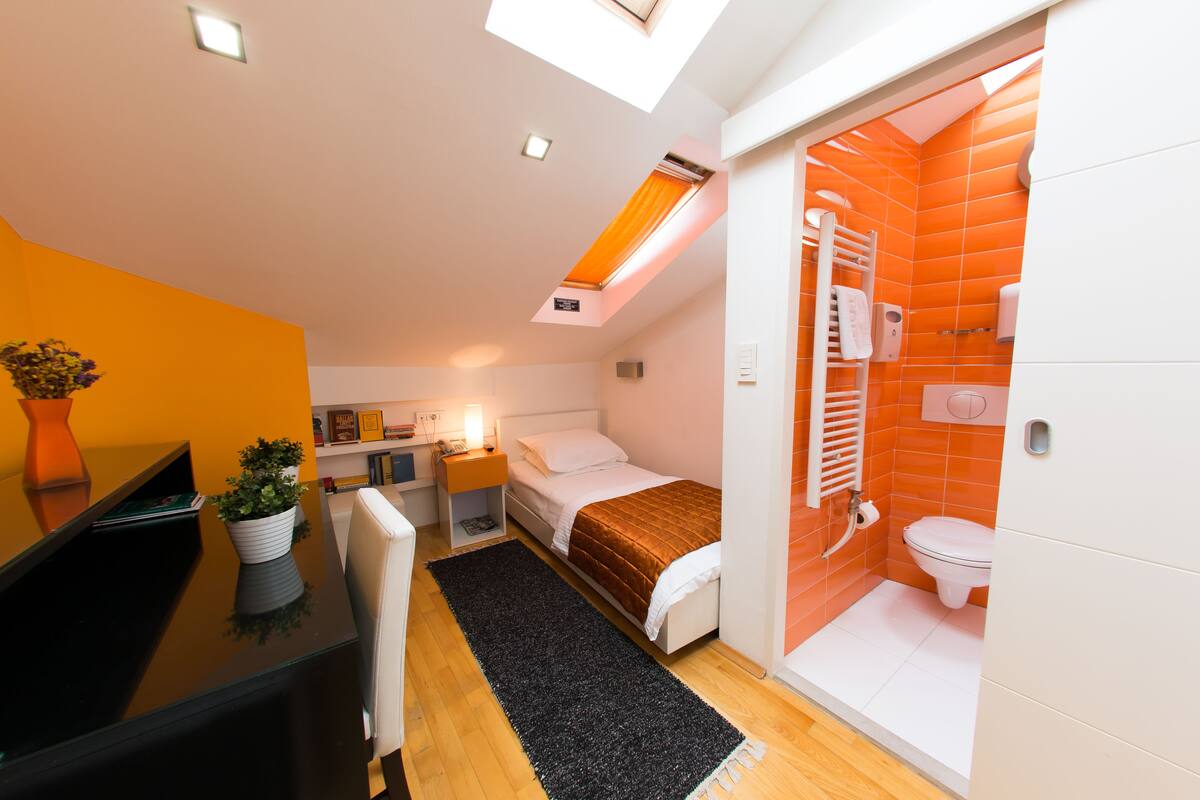 Premium bedding, down duvets, memory-foam beds, desk
