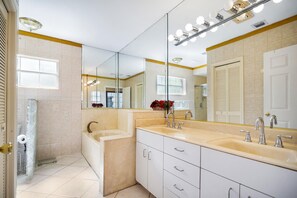Combined shower/tub, hair dryer, towels, soap