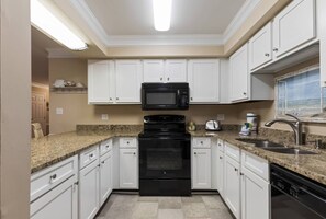 Fridge, microwave, dishwasher, coffee/tea maker