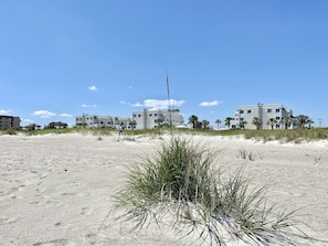 On the beach, sun loungers, beach umbrellas, beach towels