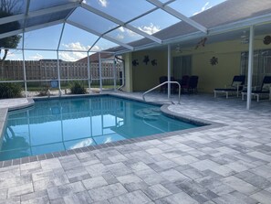 Outdoor pool, a heated pool, pool loungers