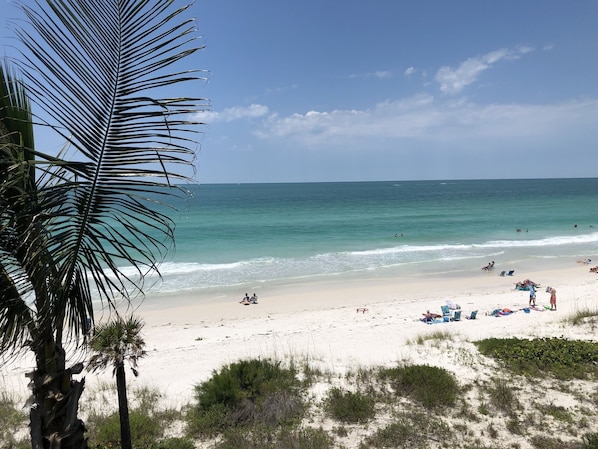 On the beach, sun-loungers, beach towels