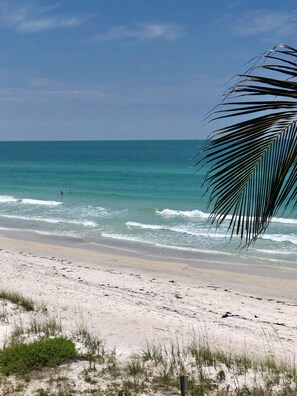 On the beach, sun-loungers, beach towels