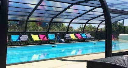 A 1 bedroom cottage that sleeps up to 4 with heated covered pool