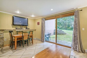 Patio Access - Step outside and enjoy the peaceful surroundings from the patio, perfect for morning coffee or unwinding after a day of adventure.