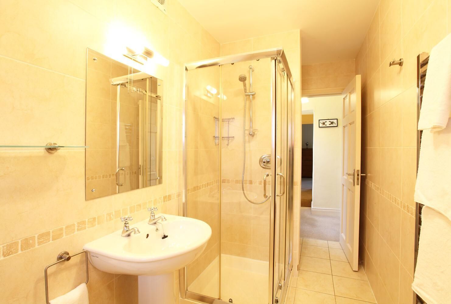 Bathtub, hair dryer, towels, soap