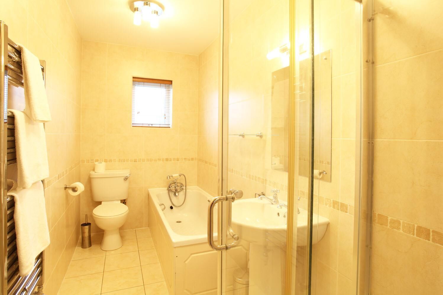 Bathtub, hair dryer, towels, soap