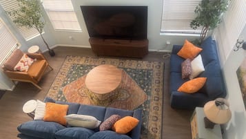 Smart TV, fireplace, DVD player, books