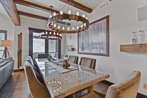 Enjoy meals in this dining area with a long table and six comfortable chairs.