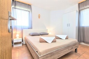 Appartement, uitzicht op strand (Olivine) | Een kluis op de kamer, gratis wifi, beddengoed