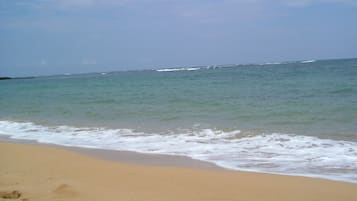 On the beach, sun-loungers, beach towels