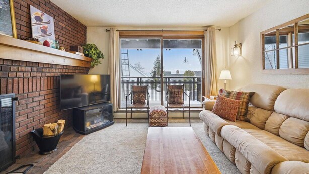 Unclassified image, 1 of 33, button - Ski-in/ski-out 2 bedroom condo with fireplace, pool & hot tub. (Killington)