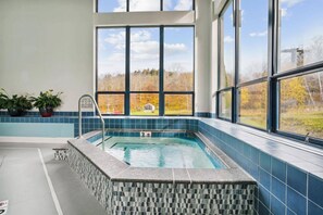 Unclassified image, 2 of 33, button - Ski-in/ski-out 2 bedroom condo with fireplace, pool & hot tub. (Killington)