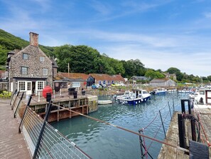 Experience the charm of a riverside town with traditional architecture and a serene natural setting.
