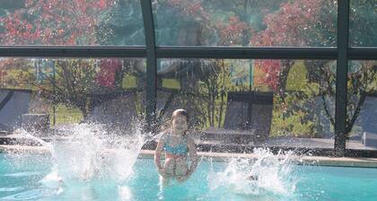 4 bedroom gite sleeping 8 with a heated covered pool