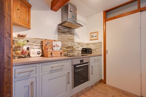 Fridge, microwave, oven, cookware/dishes/utensils