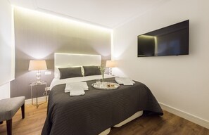 1 chambre, coffres-forts dans les chambres, fer et planche à repasser