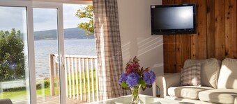 Cockleshell Lodge located at the waters edge near Otter Ferry-Pet friendly