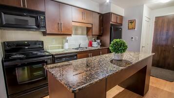 City Condo, 1 Bedroom, City View | Private kitchen | Full-size fridge, microwave, oven, dishwasher