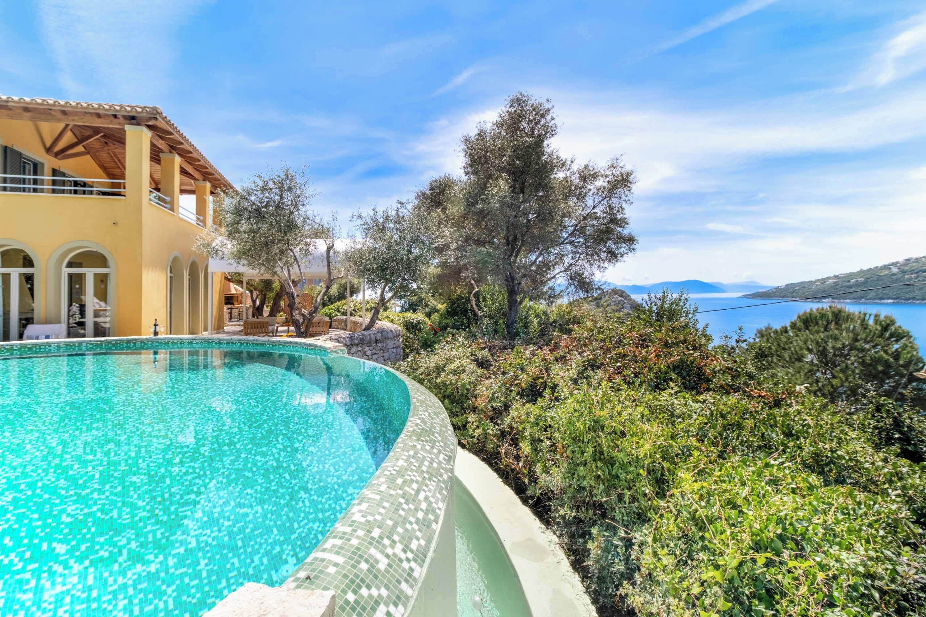 An infinity pool, pool loungers