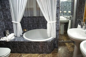 Combined shower/tub, hair dryer, bathrobes, slippers