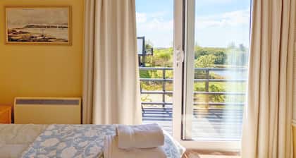 6 Avocet Quay - una casa de campo / cabina que tiene capacidad para 4 personas en 2 dormitorios