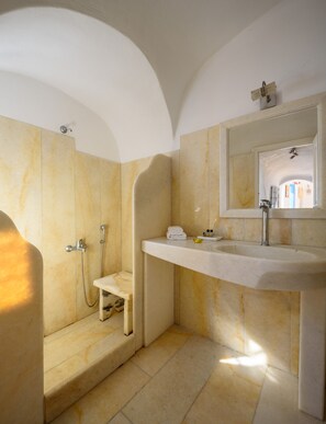 Shower, hair dryer, towels, toilet paper