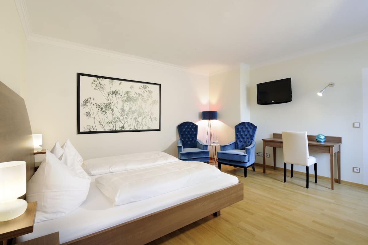 Ropa de cama de alta calidad y minibar