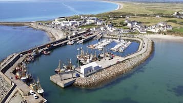 Stunning marina views surround this waterfront retreat, offering access to a breakwater and moorings for boats.